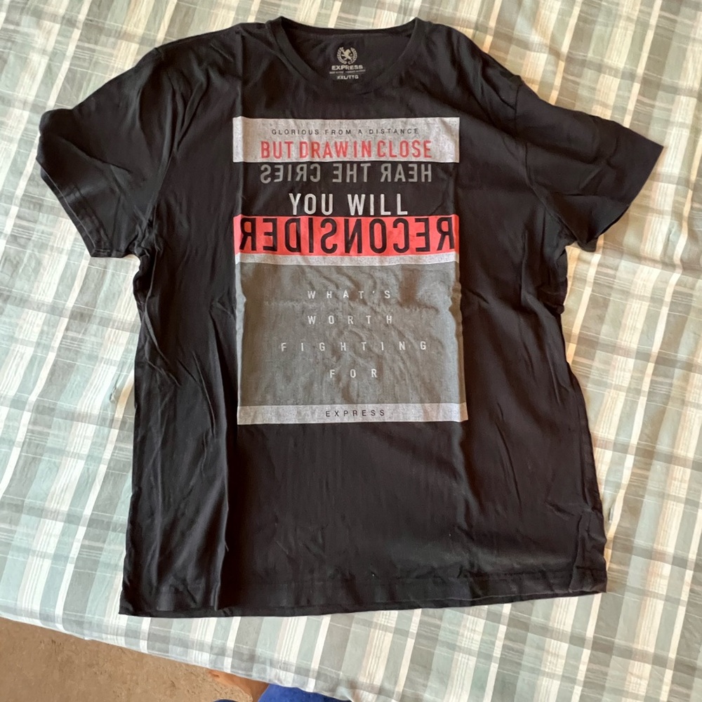 Men’s express tshirt. Size xxl but shrunk so it fits like and xl